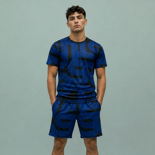 Person wearing a blue athletic outfit with black patterns on a gray background