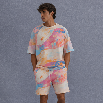 Man wearing a colorful outfit with a matching shirt and shorts on a gray background